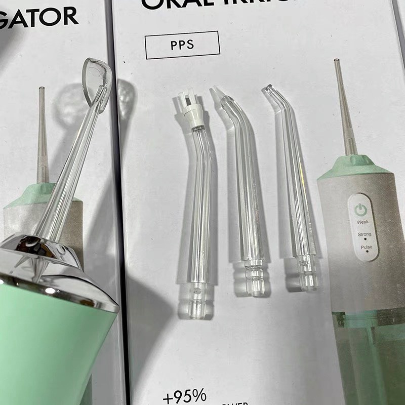 Tăm Nước Oral Irrigator 4 Đầu Phù Hợp Với Mọi Lứa Tuổi Đặc Biệt Cho Răng Niềng Răng Bọc Sứ Viêm Lợi