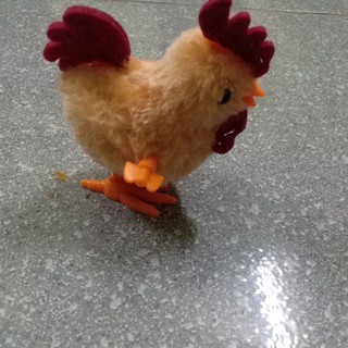 đồ chơi gà con chạy cót