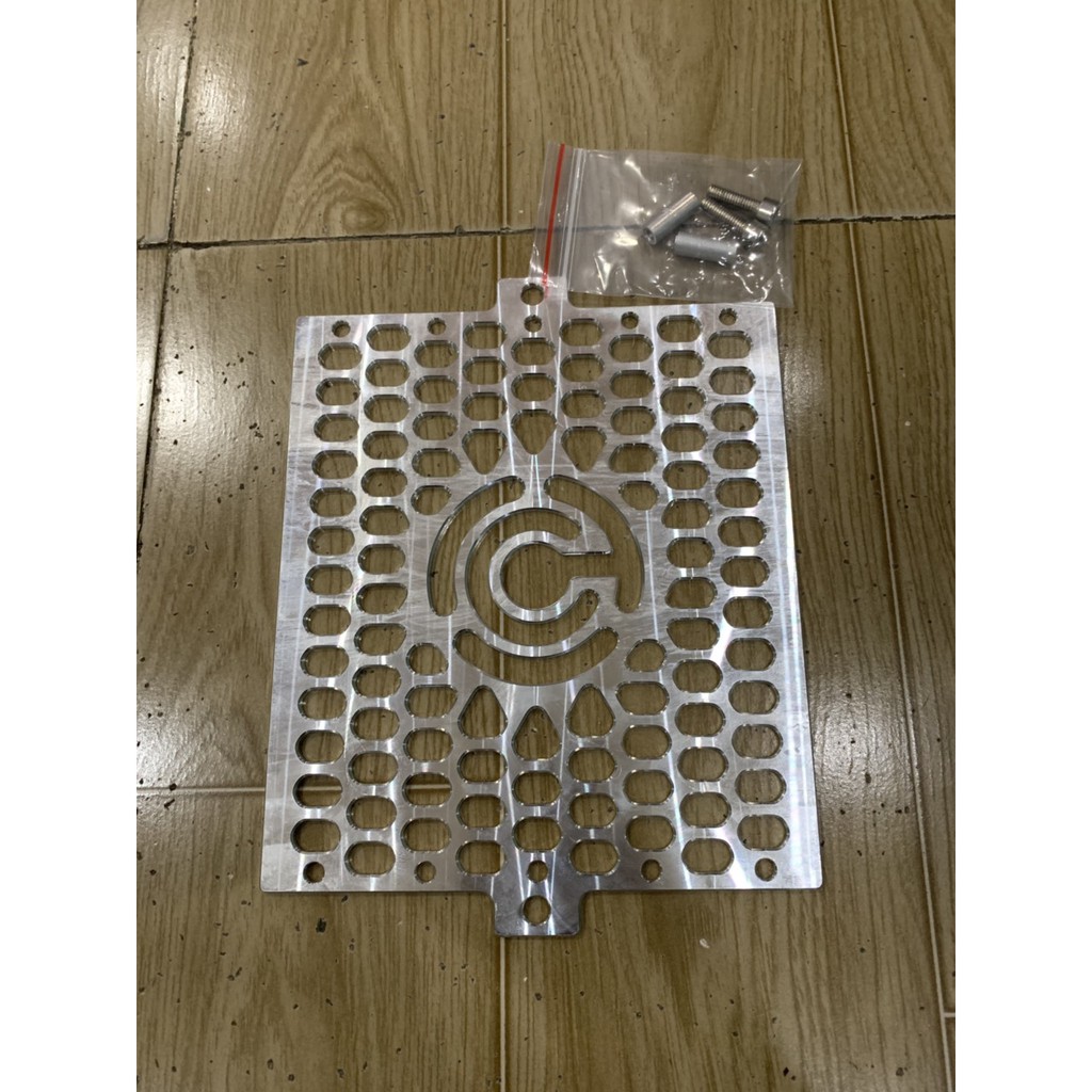 che két nước xe raider fi nhôm cnc màu bạc