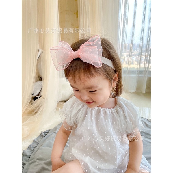 Băng đô nơ chấm đáng yêu cho bé