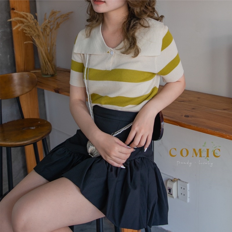 Chân váy xếp ly có lót quần Comic