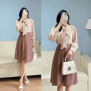 Chân váy xếp ly cúc