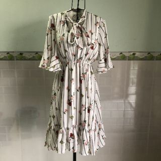 Tặng Đầm hoa xinh tay loe mới tinh