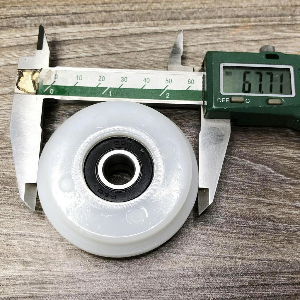 Bánh xe con lăn cửa lùa cửa trượt phi 68mm dùng cho ray lùa âm D6826d12T7D