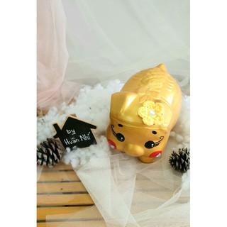 Heo đất handmade - heo sơn nhũ vàng.