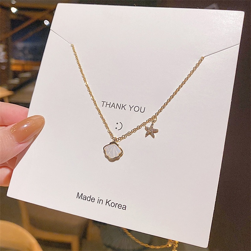 Dây chuyền thép titan mặt sao biển vỏ sò phát quang phong cách Nhật Hàn cho nữ