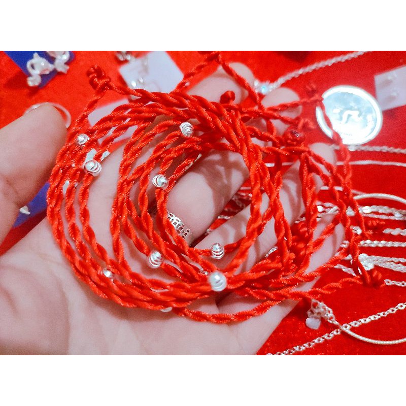 Dây chỉ đỏ mix bi bạc ta may mắn