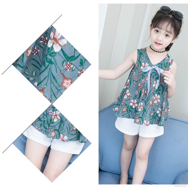 Bộ áo sát nách in hoa + quần ngắn màu trắng cho bé gái