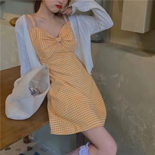 Váy 2 dây caro vàng nơ ngực