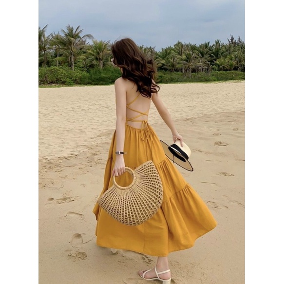 Đầm váy maxi vàng nghệ đan dây sau đi biển | BigBuy360 - bigbuy360.vn