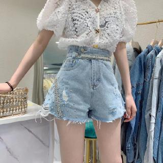 Quần short jeans lưng cao đính đinh tán cá tính cho nữ