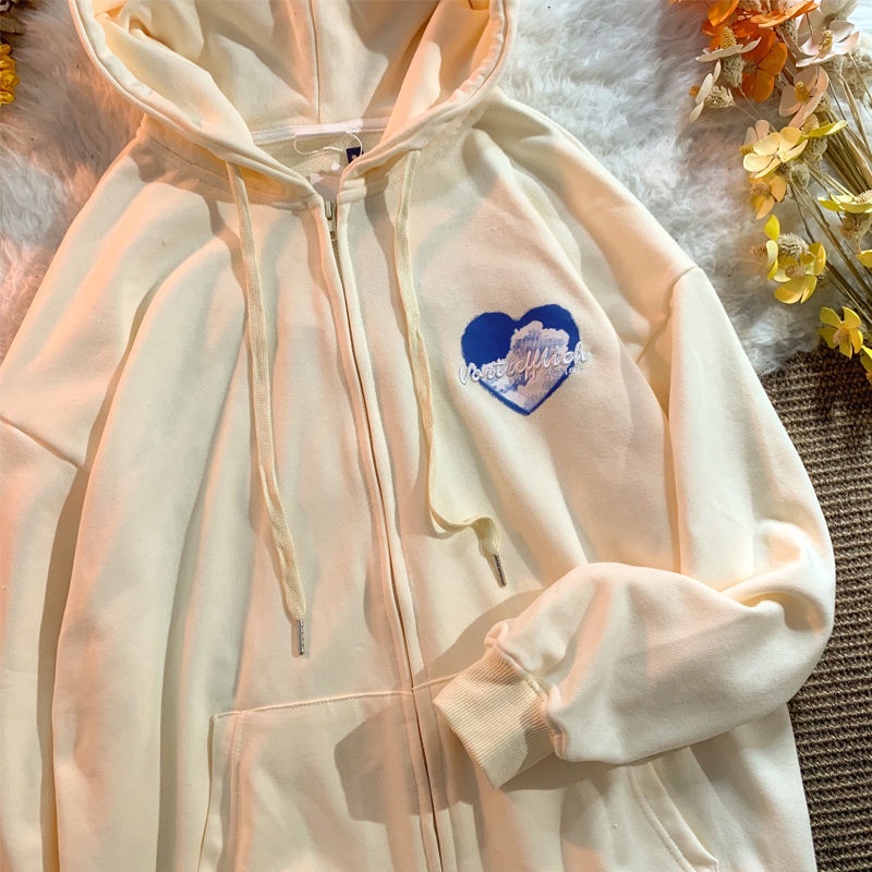 Áo Hoodie Tay Dài Dáng Rộng Có Khóa Kéo Họa Tiết Trái Tim Màu Kem Thời Trang Mùa Thu Cho Nữ