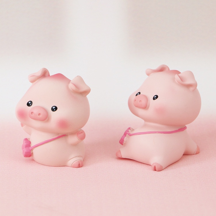 4 chú heo nhỏ trang trí taplo xe ô tô đeo túi hồng xinh xắn