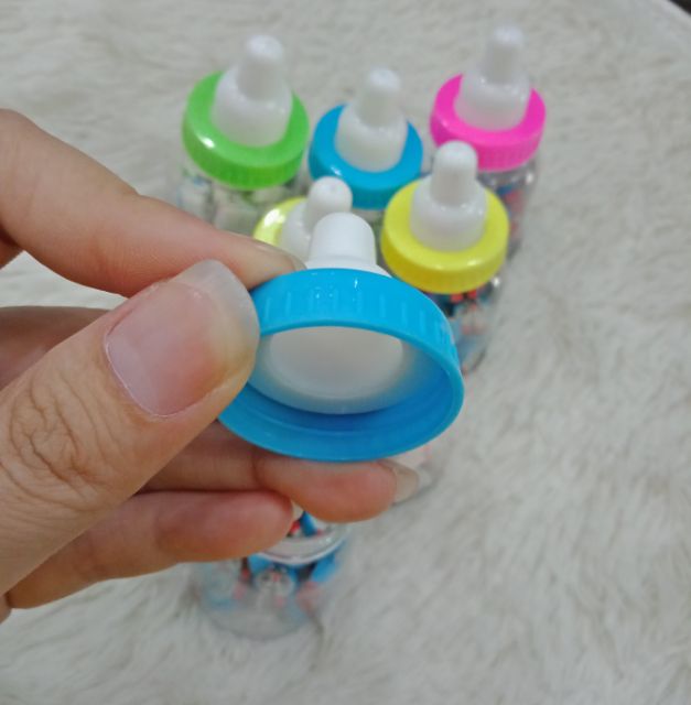 Gôm mini trong bình sữa Doraemon và Kitty 1cmx1cmx24 cục SP000029