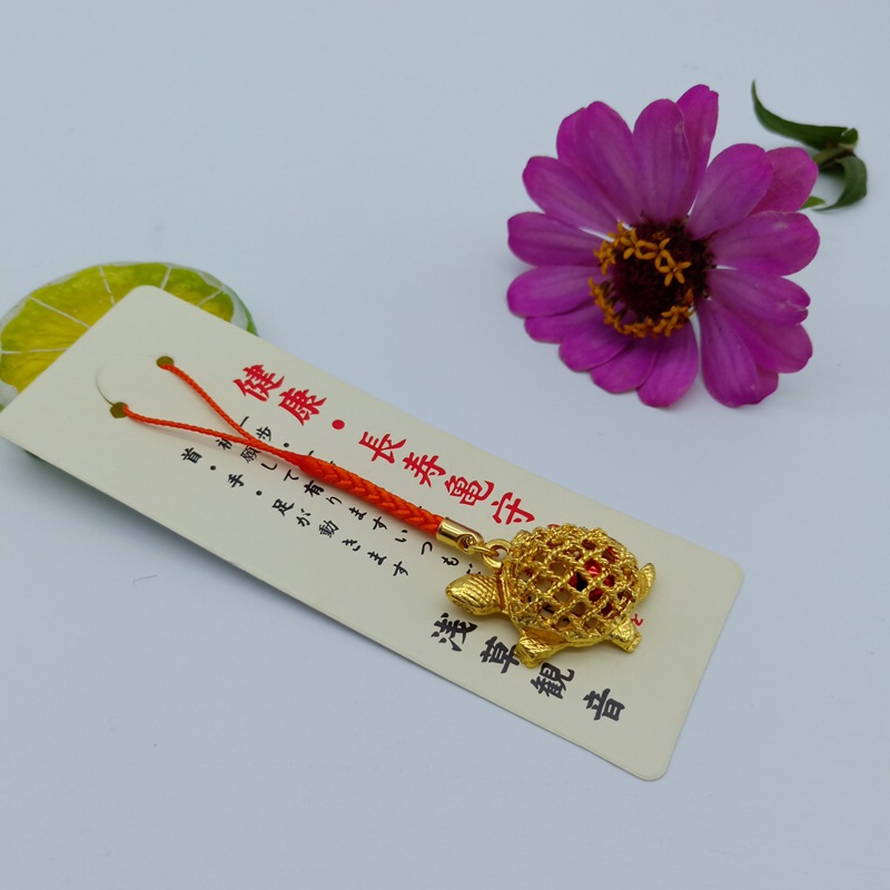 Hole Engraved Golden Turtle Bell