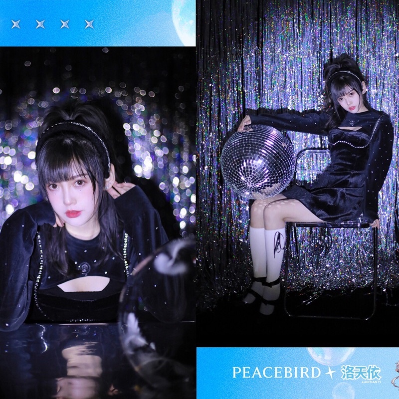 Đầm nhung đen Peacebird