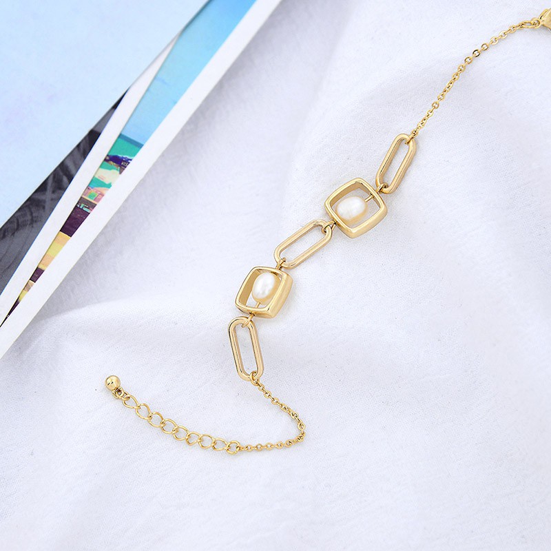 Vòng tay đính hạt giả ngọc trai đơn giản