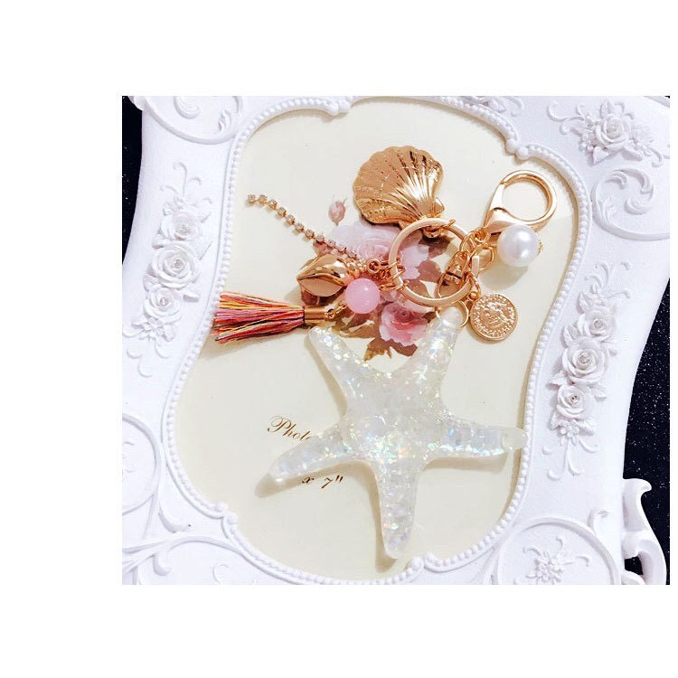 MÓC KHÓA SAO BIỂN DẠ QUANG