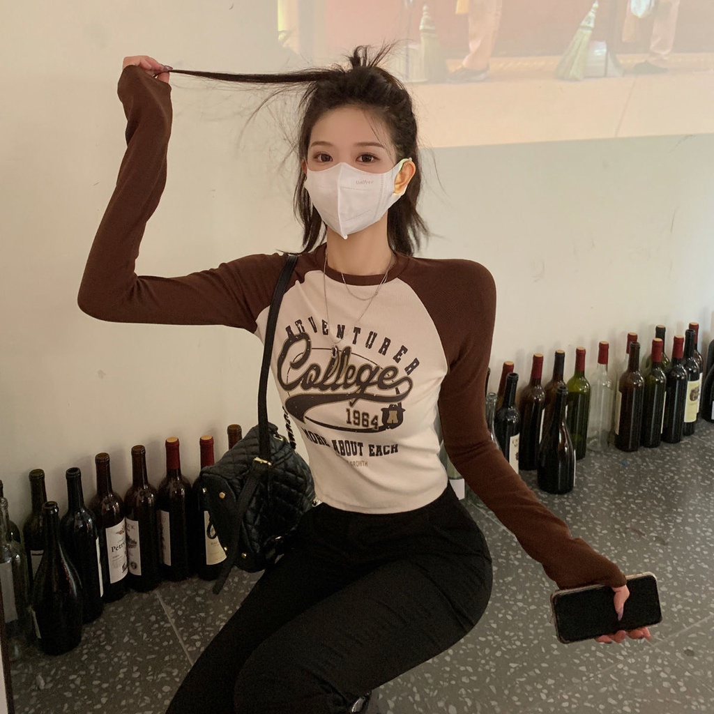 Áo thun tay dài in họa tiết màu sắc tương phản đầy phong cách cho nữ