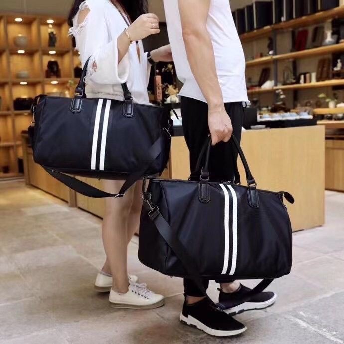 Túi du lịch cầm tay, tập gym thể thao nam nữ phiên bản Hàn Quốc vải thô sành điệu, đeo vai, đựng quần áo công sở túi xách túi đựng nhãn hiệuTúi xách