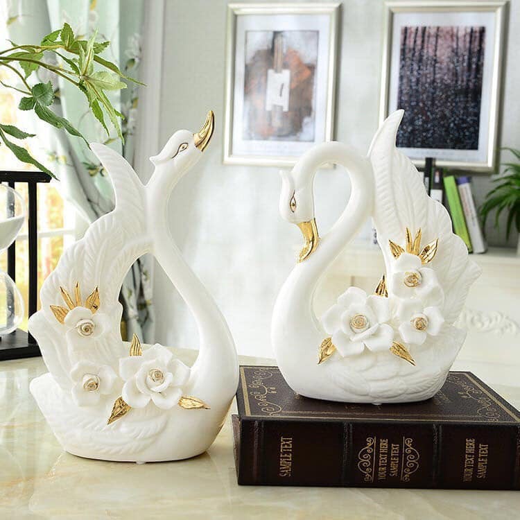 Cặp thiên nga decor hoa trắng