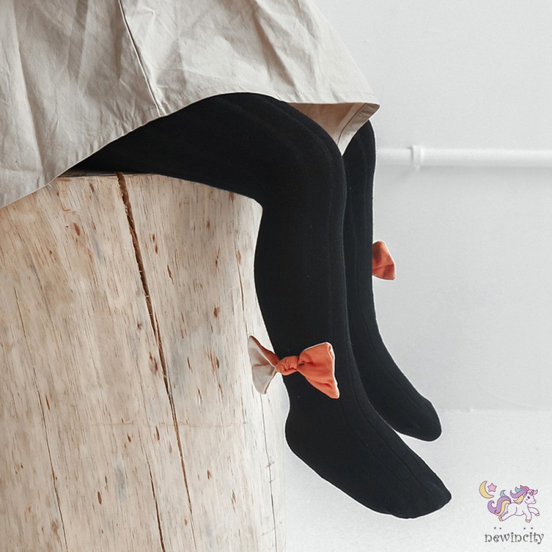 Quần legging phối nơ phong cách thời trang tinh tế cho bé gái