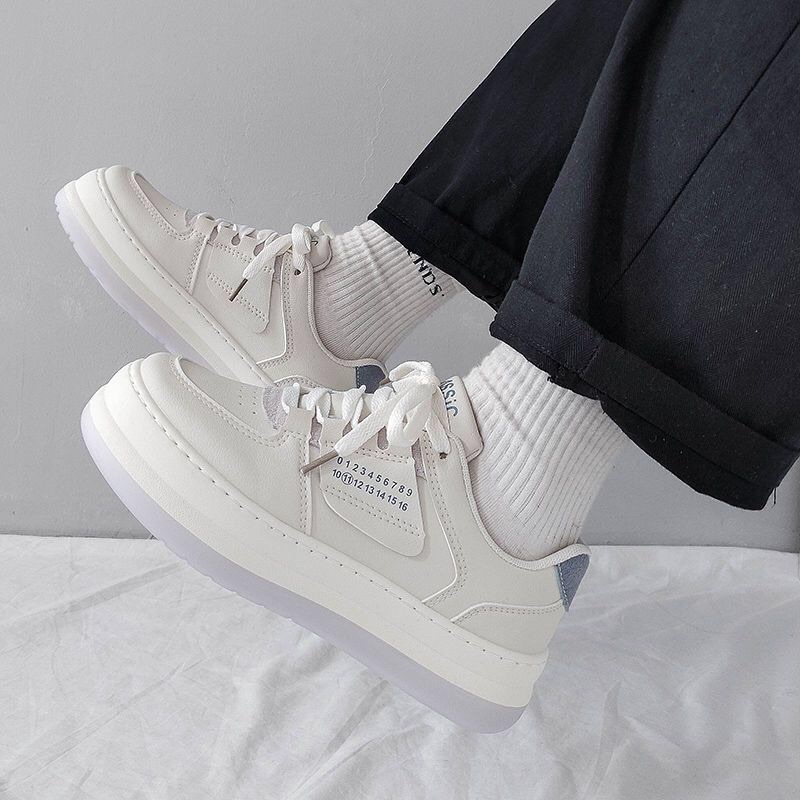 Giày thể thao nữ số 11 màu kem gót xanh đen