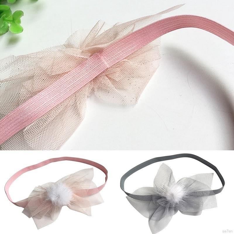 Băng đeo đầu có chi tiết quả bóng lông dễ thương cho bé