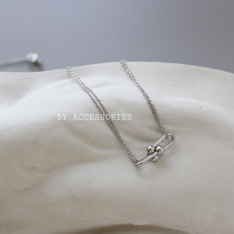 Dây chuyền titan kiểu khóa móng ngựa không gỉ phim Penthhouse