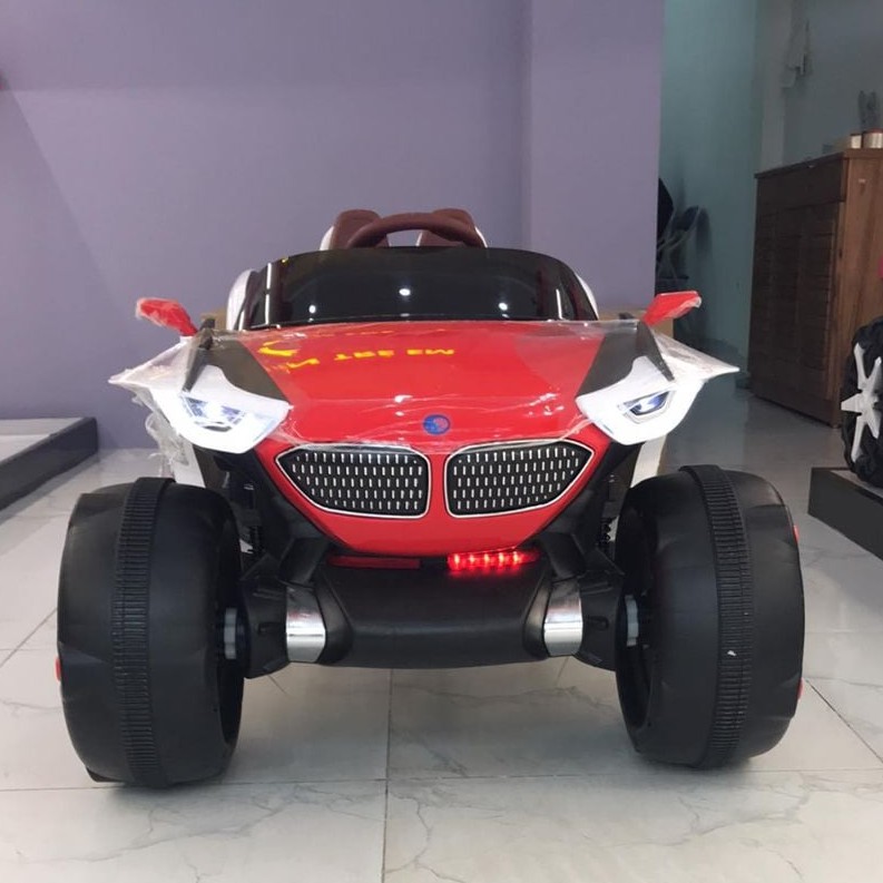Ô tô xe điện đồ chơi KIDVIET-PRO XJL-688 mẫu địa hình 2 ghế 4 động cơ cho bé (Đỏ-Cam-Xanh)