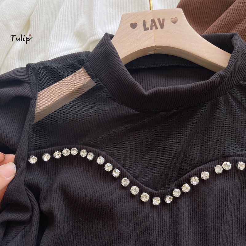 Áo cổ lọ pha lưới đính đá