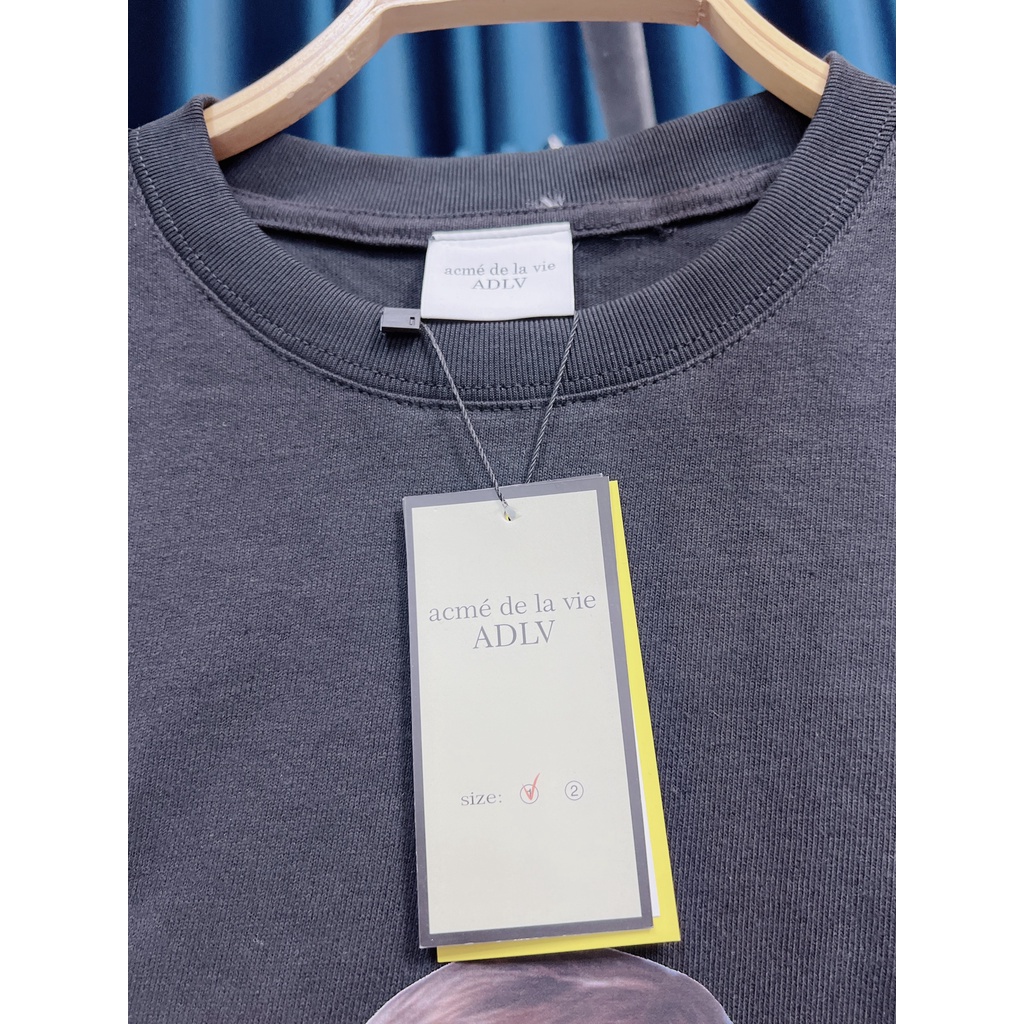 Áo ADLV Phông Tay Lỡ Em Bé Cầm Bánh Form Rộng Thời Trang Hot trend