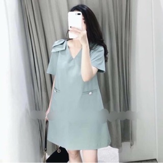 Váy xuông 2 túi giả nơ vai