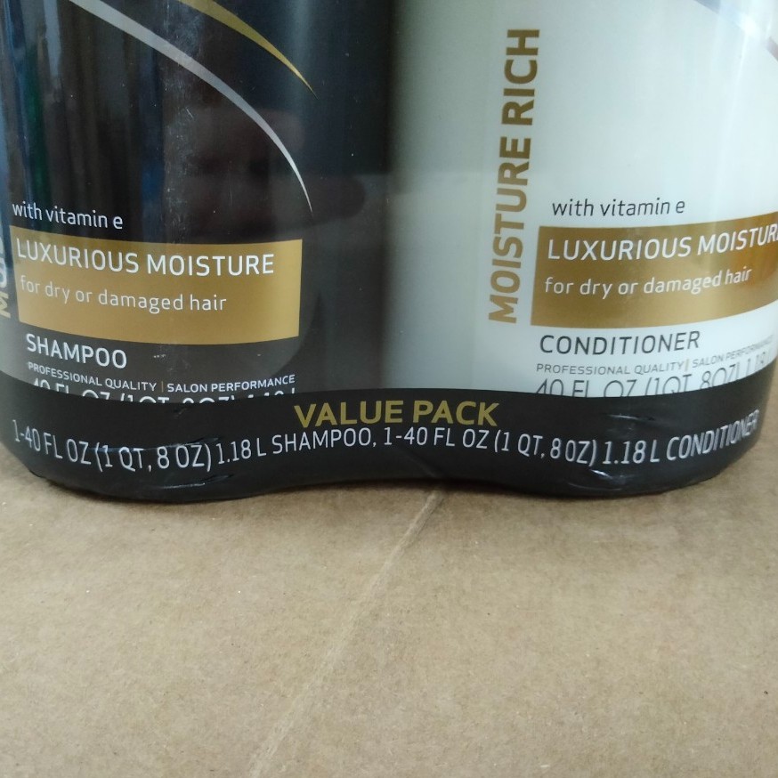 Bộ dầu gội xả Tresemme Luxurious Moisture Rich - 1.18L/chai đen-trắng Mỹ