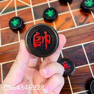 bộ bàn cờ tướng và quân cờ gỗ trắc.