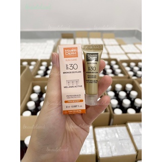 Kem chống nắng martiderm sun care bronze d fluid spf30