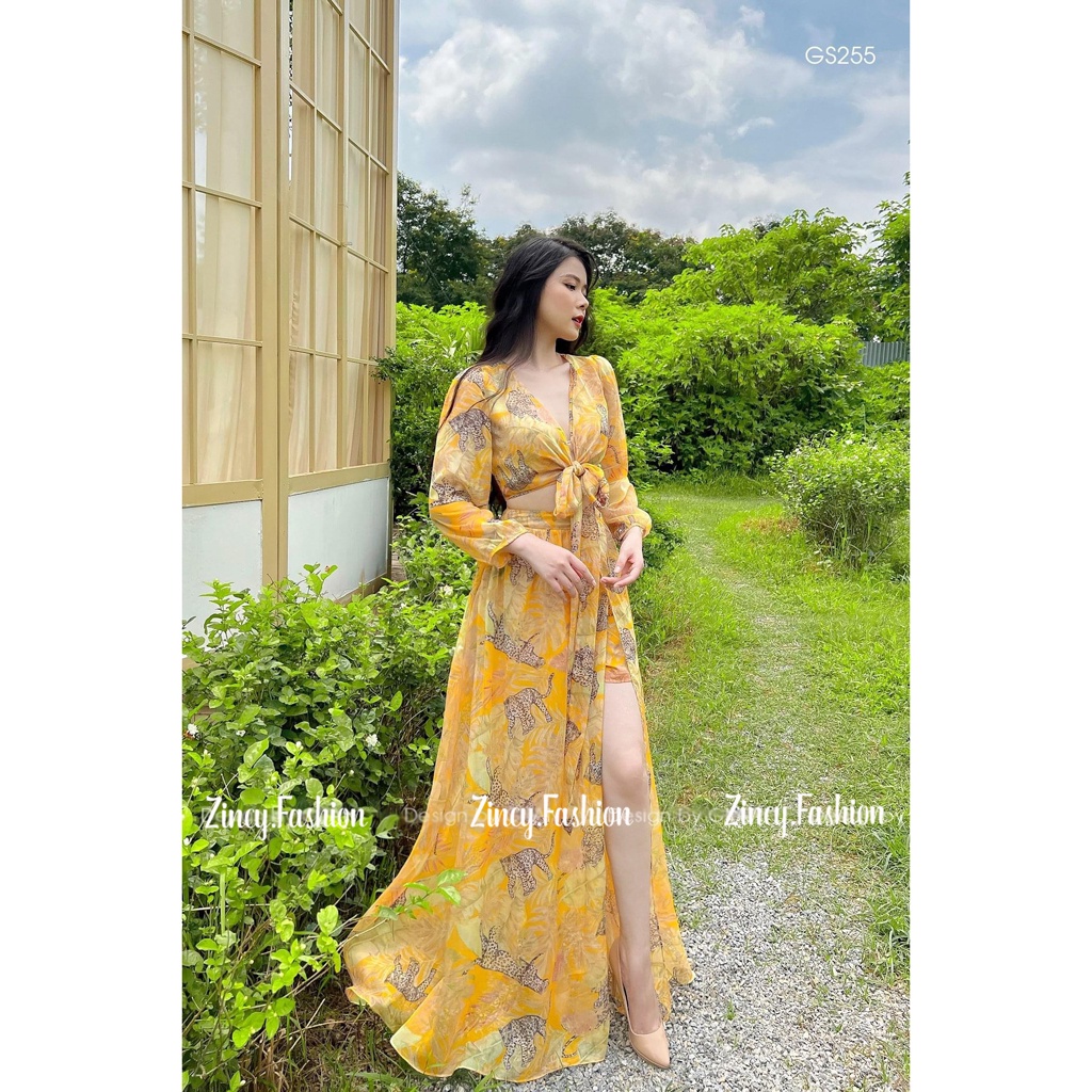 Set đi biển áo tay dài cột eo chân váy maxi xẻ tà màu vàng hoạ tiết nổi bật Váy maxi đầm đi biển Kèm hình thật