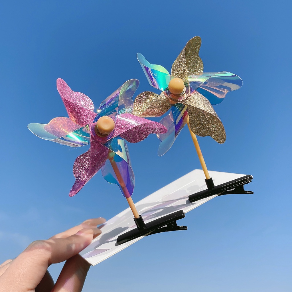 Kẹp tóc bé gái thiết kế chong chóng dễ thương có thể xoay vòng