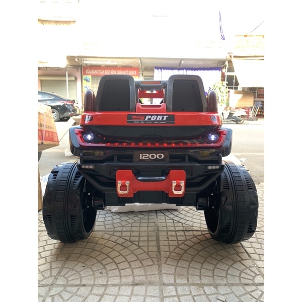 Oto điện 1200 rẻ nhất thị trường xe bình tỏ sạc điện khoẻ có nhạc blt…xe to  đẹp mẫu mà ga tự động và điều khiển từ xa