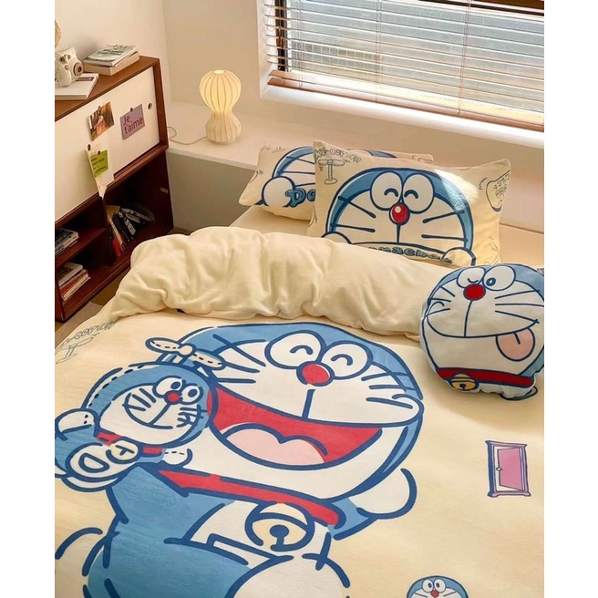 Bộ sản phẩm Chăn Ga Gối nỉ nhung sữa thế giới Disney cùng Doremon, chăn ga hoạt hình siêu cấp chất liệu mềm ấm cho bé