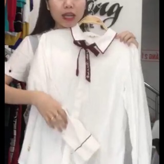 Sơ mi trắng nơ đỏ
