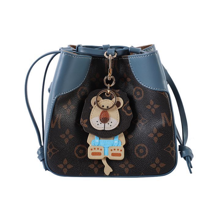 Miocra koly lion king old hua bucket bag nữ mùa hè niche nhẹ túi nữ sang trọng đeo vai túi messenger