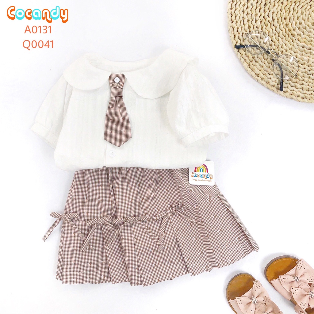 Set đồ cho bé- Áo Trắng cổ tròn bẻ và Quần váy NÂU đính nơ của COCANDY mã A0131, Q0041