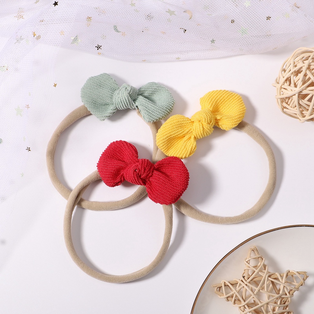 Dây buộc tóc KIDSBOWS phối nơ màu trơn xinh xắn cho các bé