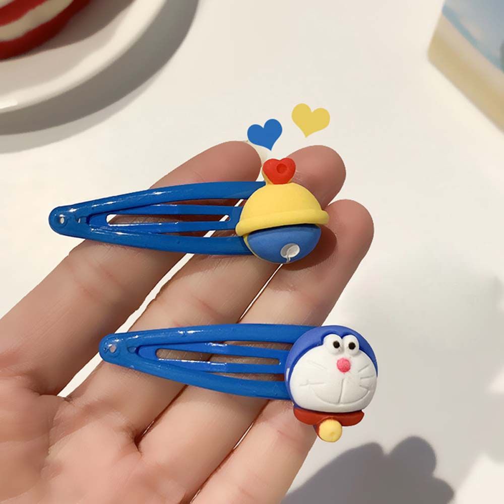 Dây cột tóc cao su/ kẹp tóc mặt hình Doraemon dễ thương phong cách Hàn Quốc cho nữ