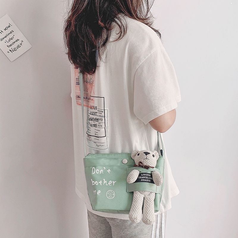 Messenger bag túi vải của phụ nữ 2021 túi đeo vai mới mùa hè túi nhỏ sinh viên giản dị tất cả các trận đấu đi làm túi đe