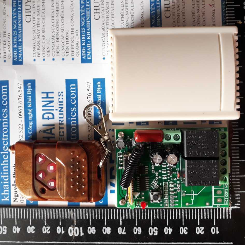 hộp mpdule RF input:220vac, 315mhz, 2 Relay + remote 4p KDE2097