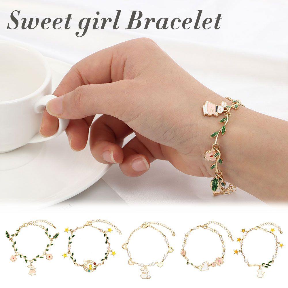 Vòng Tay Chuỗi Hạt Ngọc Trai Mặt Hình Thỏ Và Hoa Lá Dễ Thương Cho Nữ