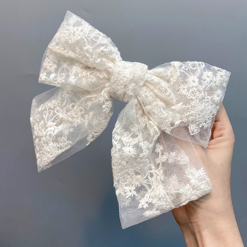 Kẹp tóc gắn nơ ren xinh xắn trang trí cho bé gái