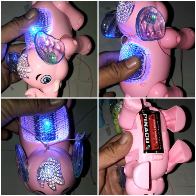Một Chú Voi mô hình bằng nhựa chạy pin có nhạc và đèn Led rất đep_tặng kèm pin